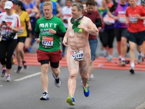 LONDON, UNITED KINGDOM - APRIL 26: A runner dressed in a naked suit in the mass start during the Virgin Money London Marathon on April 26, 2015 in London, England. (Photo by Stephen Pond/Getty Images)