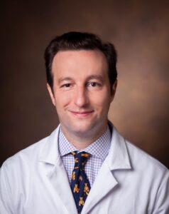Portrait photograph of Michael J Neuss.