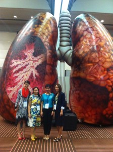 An enormous set of lungs demonstrate in graphic detail the effect of smoking